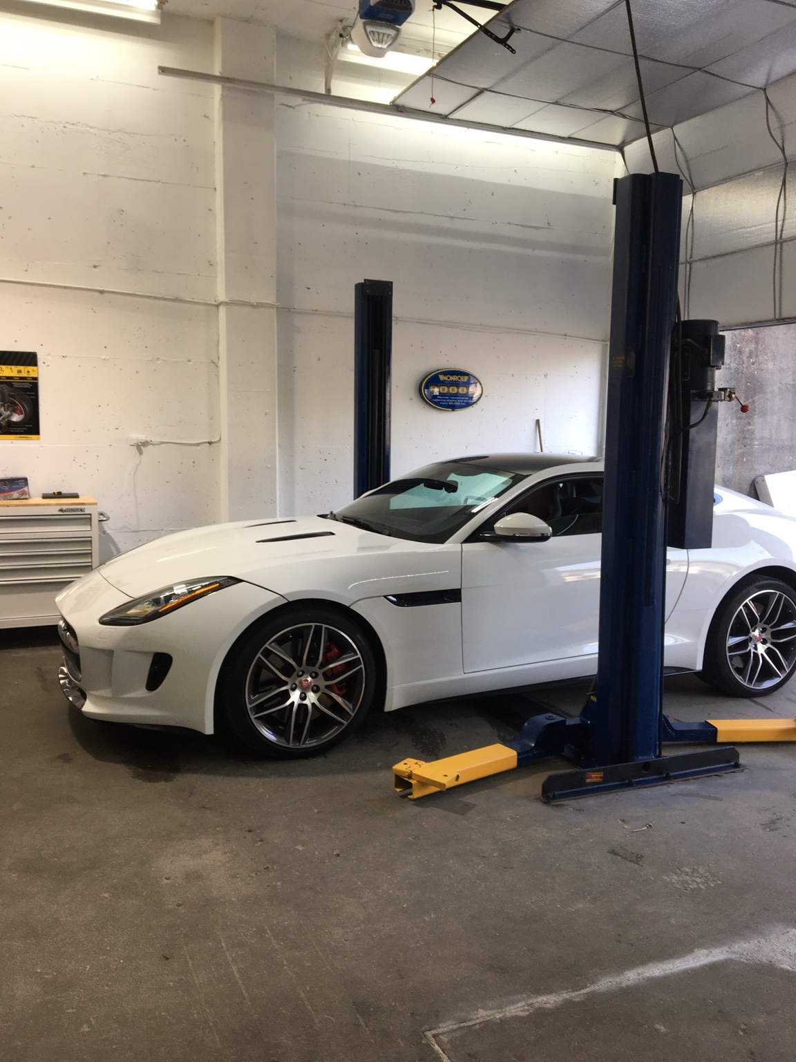 White Jaguar F-Type R in the workshop