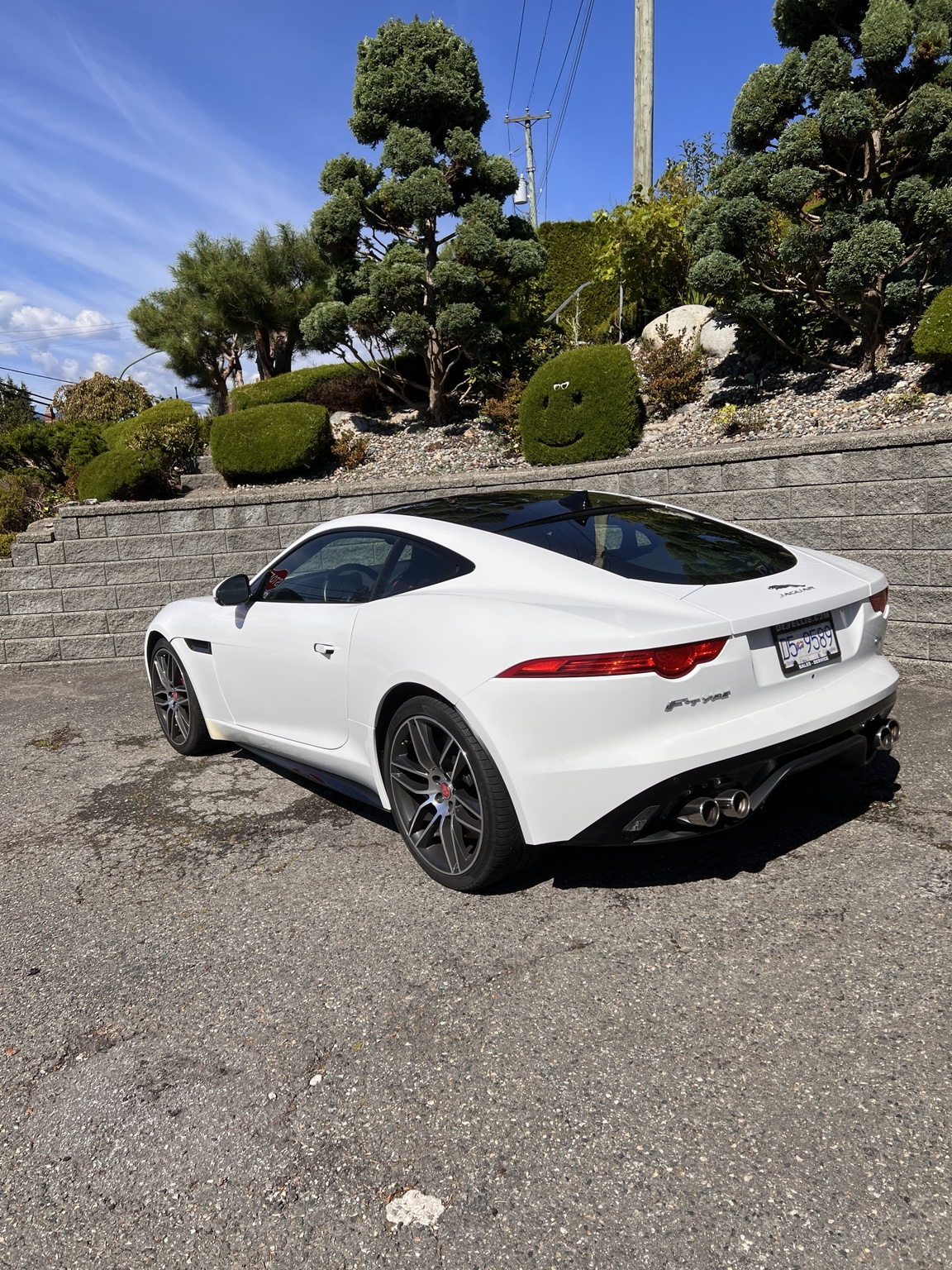 Jaguar F-Type R — Rear three-quarter view in the sunshine