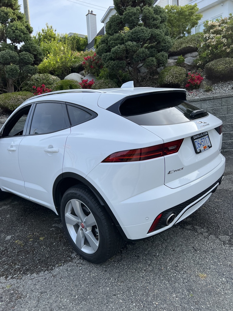 White Jaguar E-PACE viewed from the rear three-quarter angle
